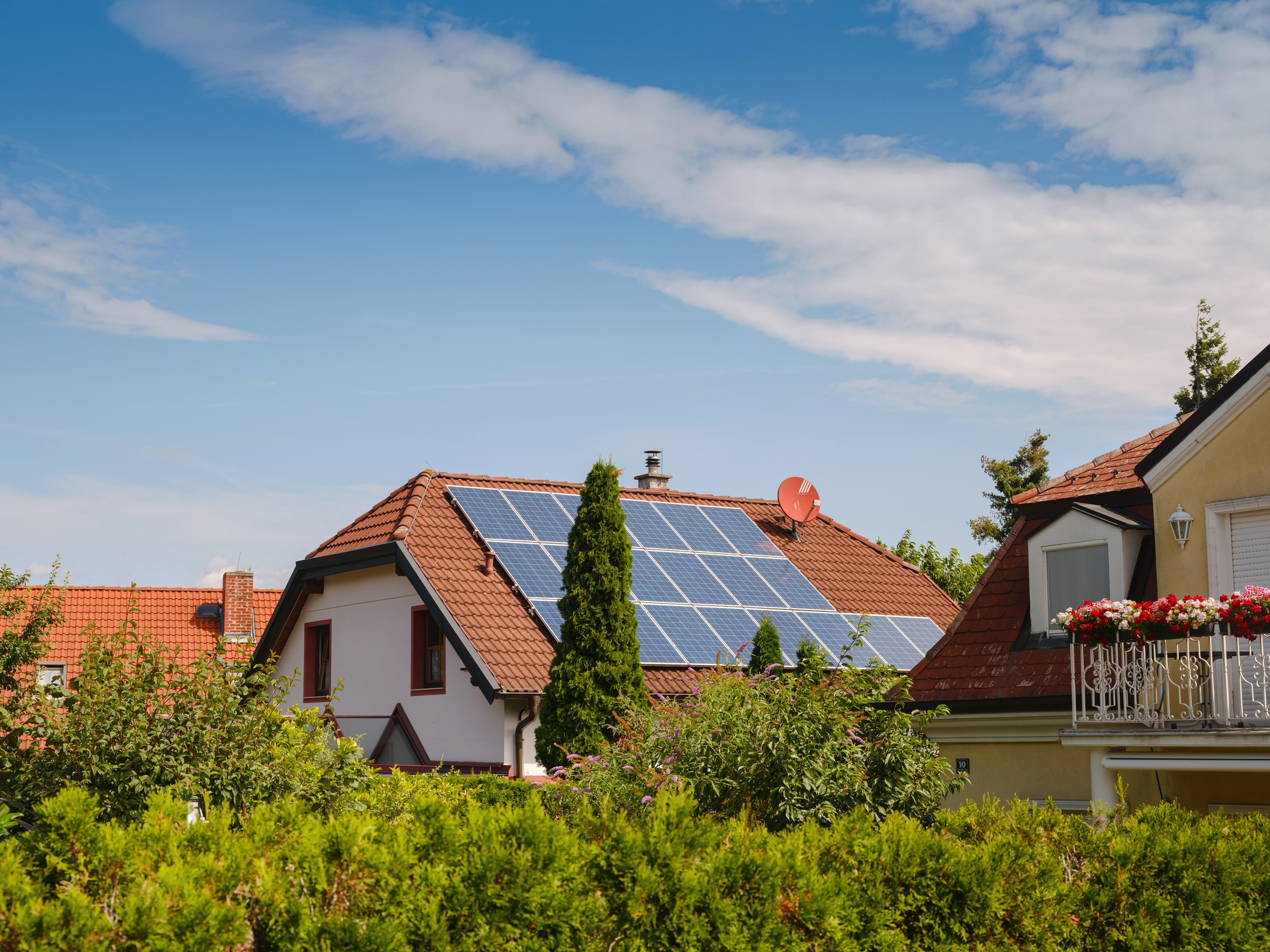 Solar photovoltaic panels on house roof